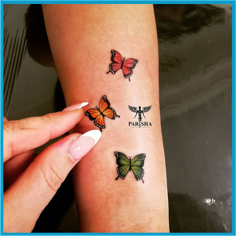 تاتو پروانه مینیمال روی ساق دست